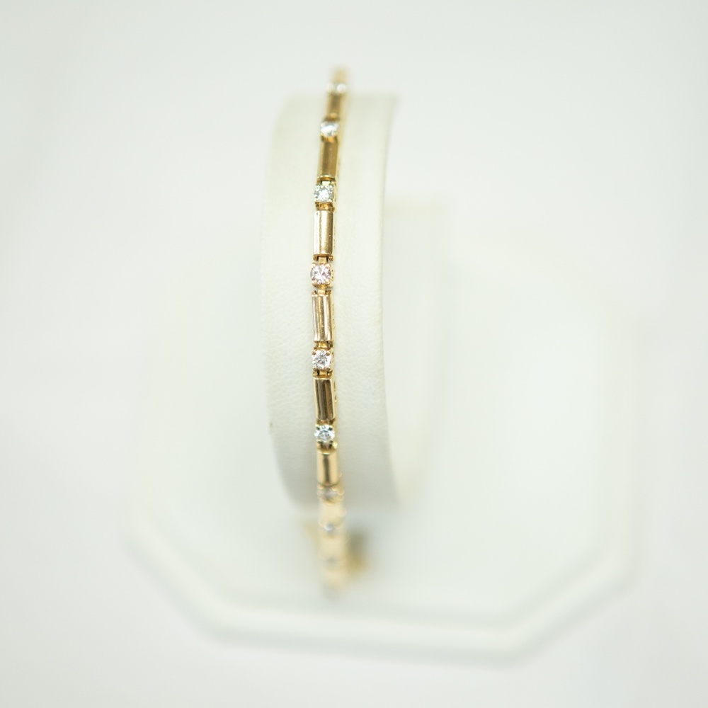 14k yellow gold round diamonds.